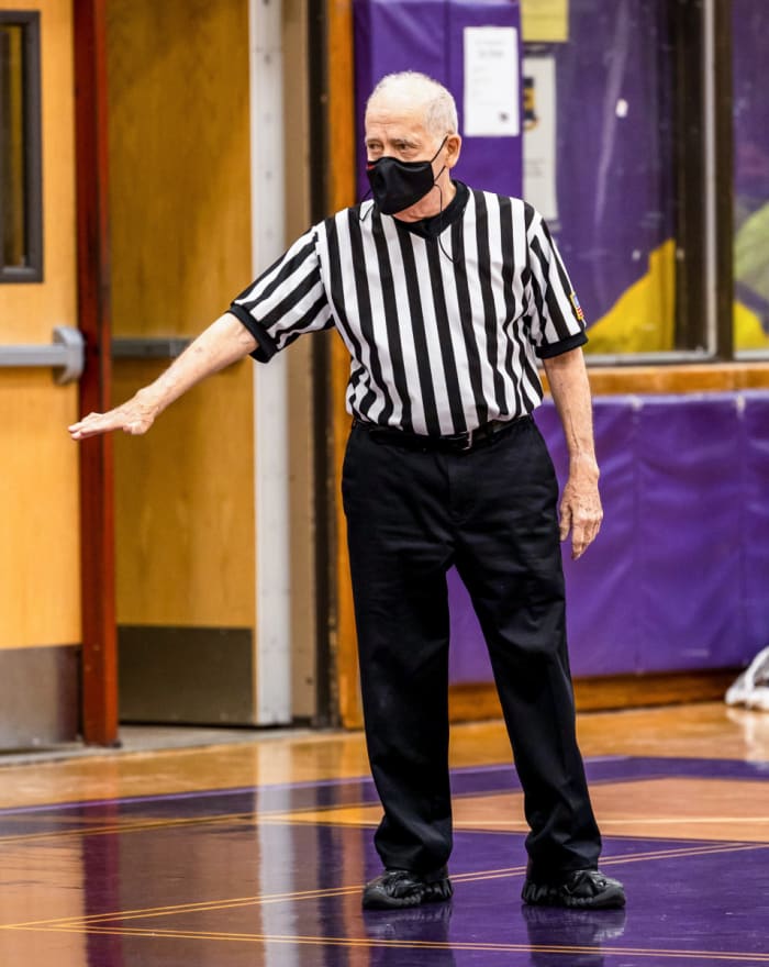 Longtime Newsday baseball writer Joe Donnelly referees a youth basketball game.